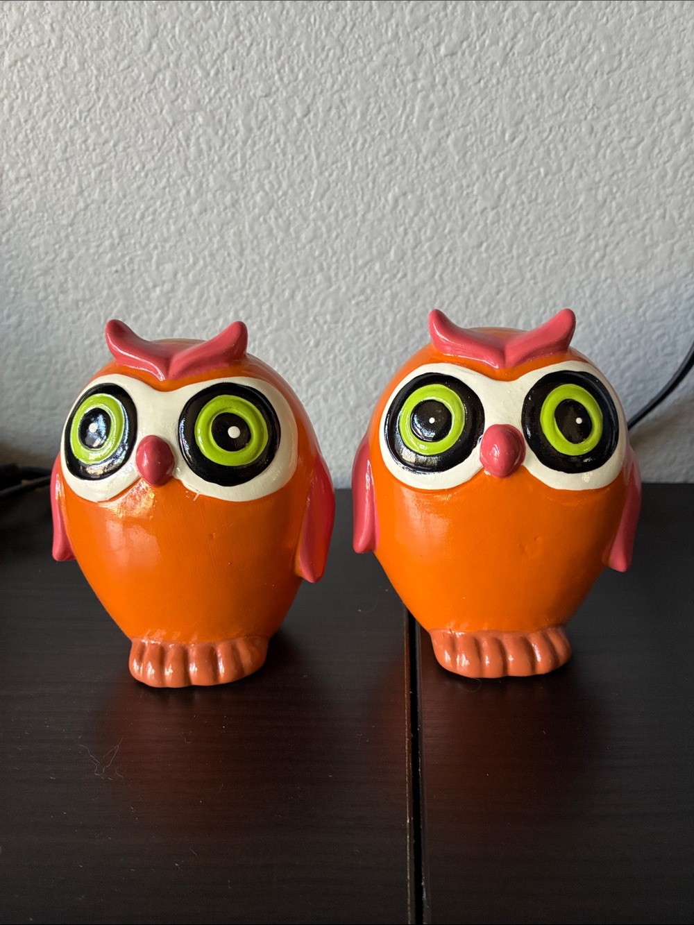 Playful Orange Owl Figurine Pair with Pink Accents